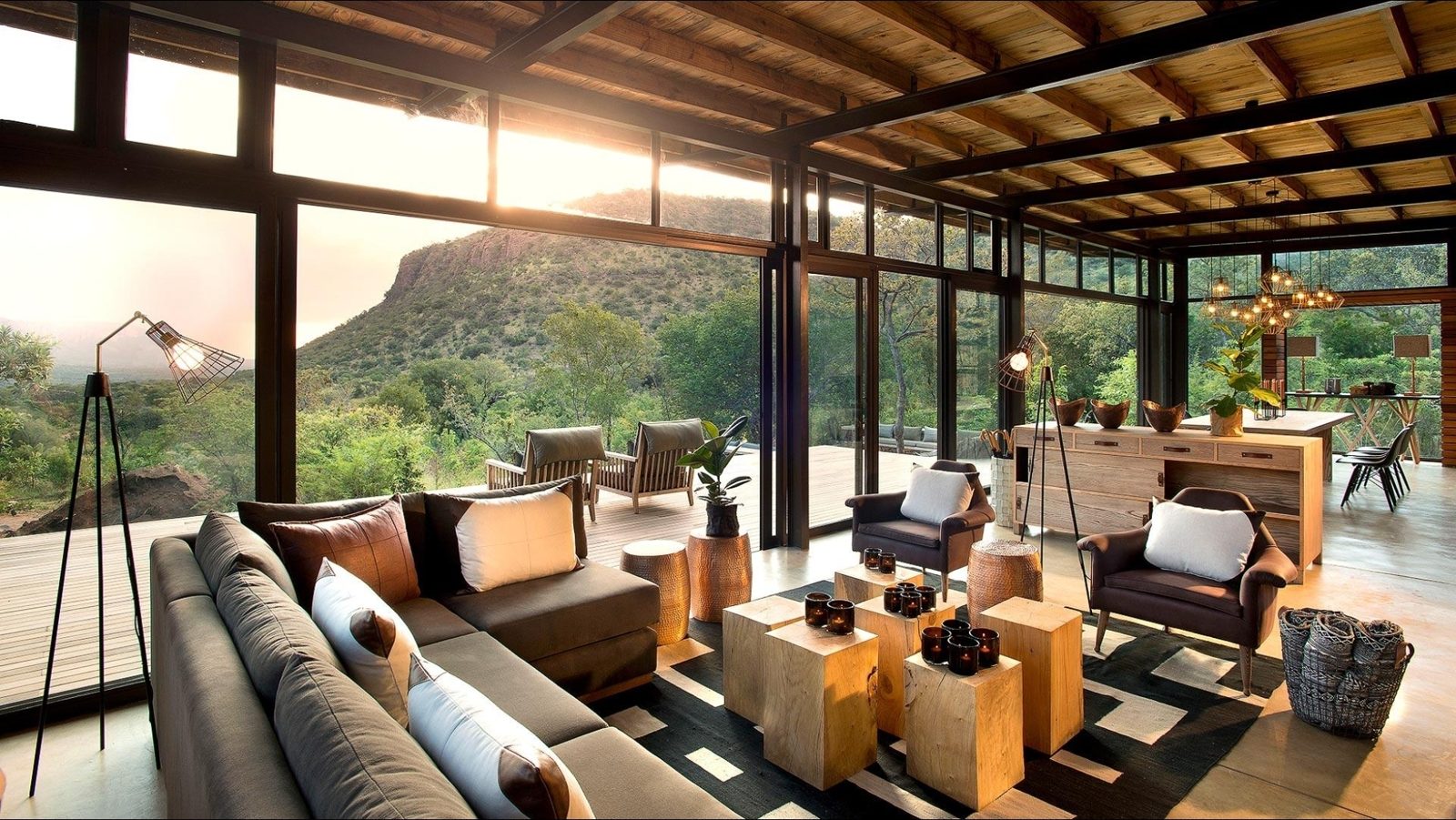 Lodge lounge with views over forested hills